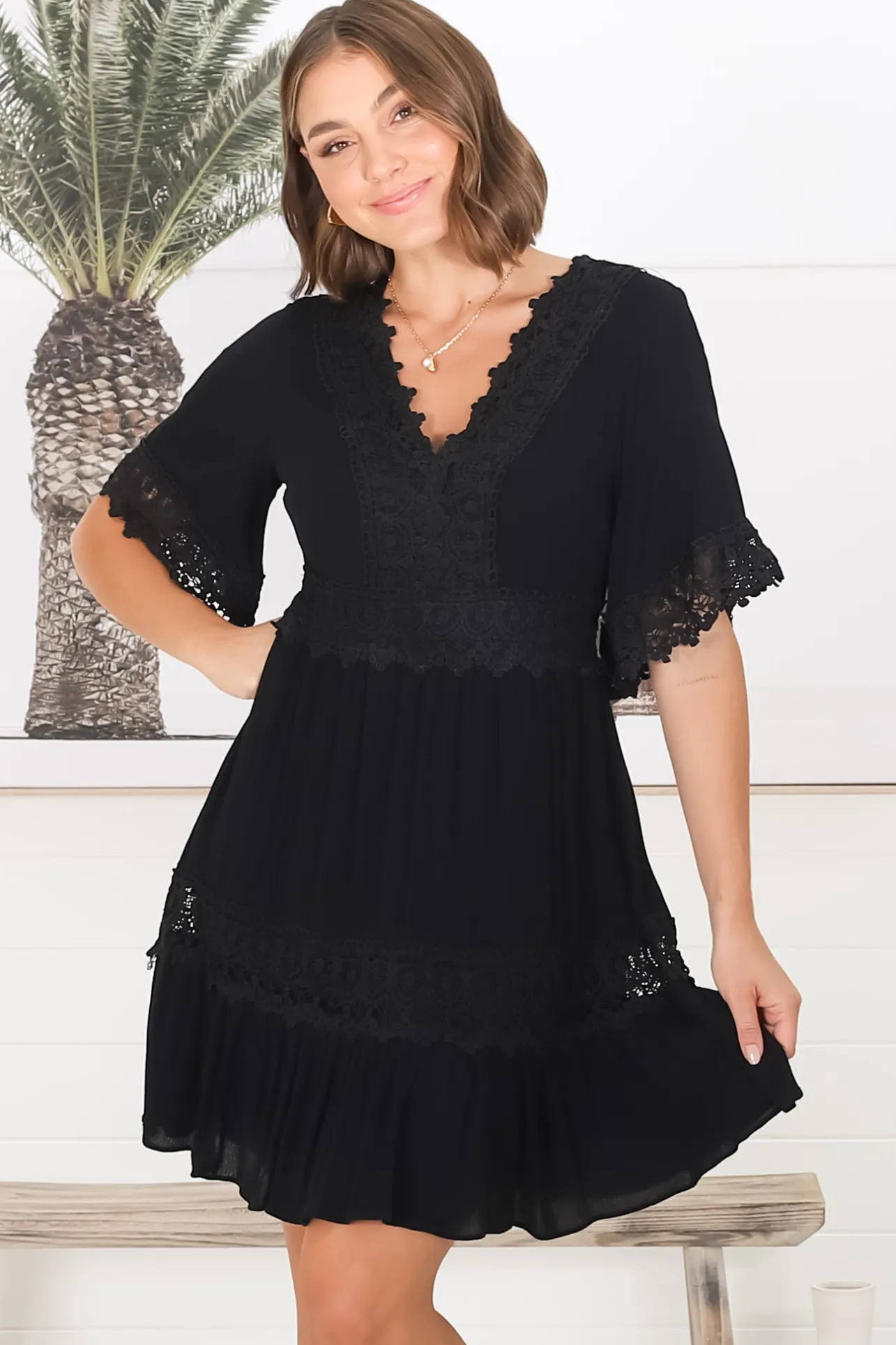 Leelie Mini Dress - Lace Embellished Tiered Dress with Bell Sleeves in Black>Salty Crush