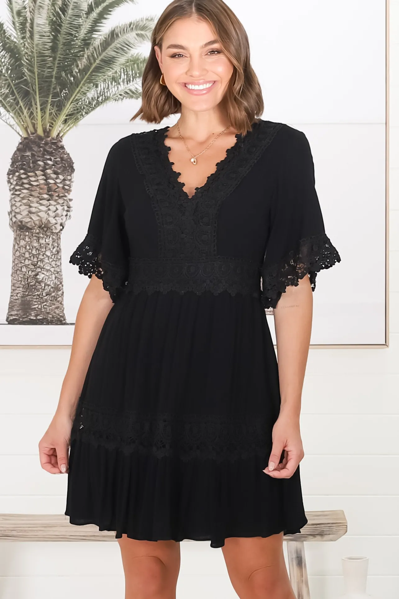 Leelie Mini Dress - Lace Embellished Tiered Dress with Bell Sleeves in Black>Salty Crush