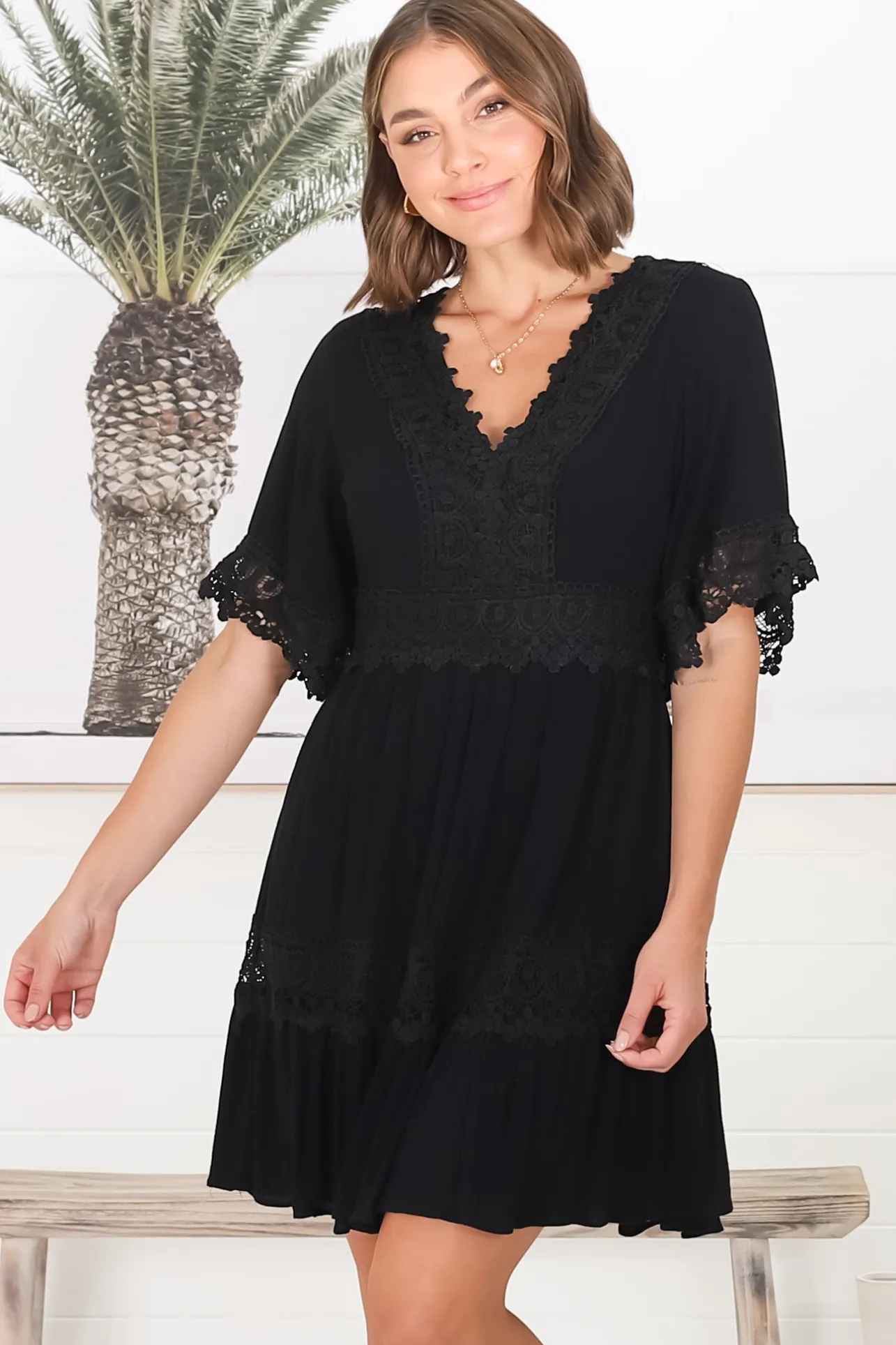 Leelie Mini Dress - Lace Embellished Tiered Dress with Bell Sleeves in Black>Salty Crush