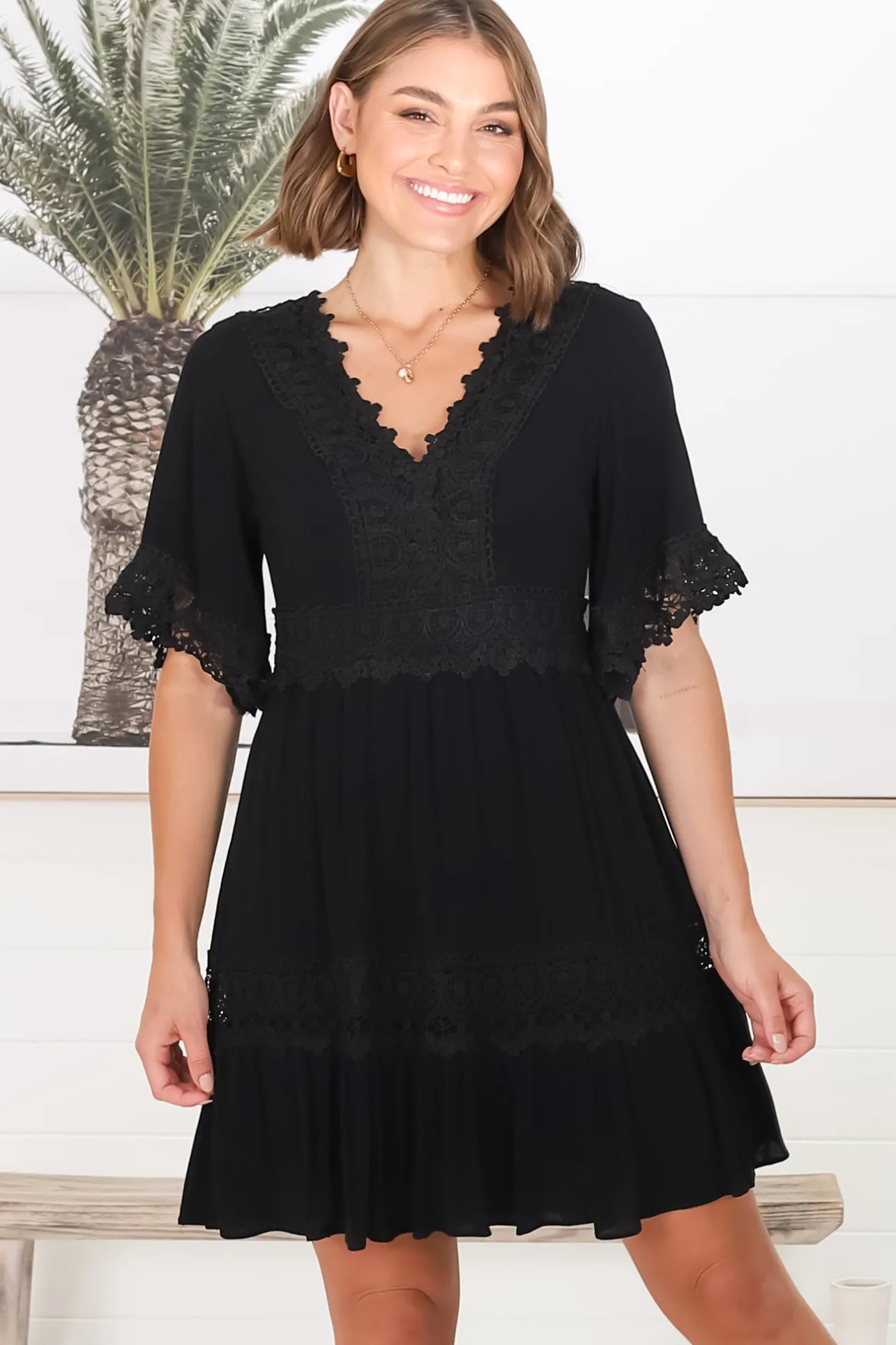 Leelie Mini Dress - Lace Embellished Tiered Dress with Bell Sleeves in Black>Salty Crush