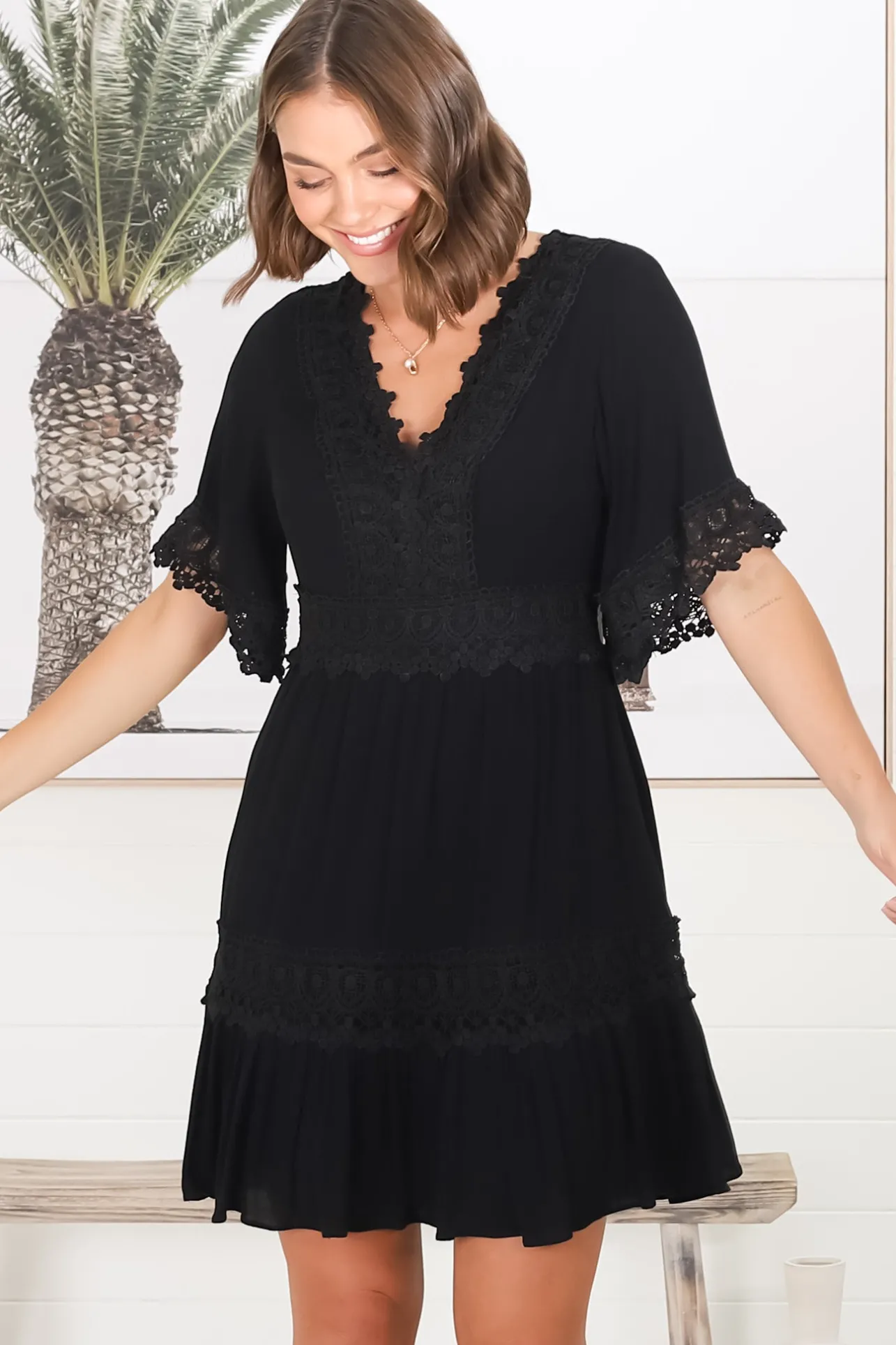 Leelie Mini Dress - Lace Embellished Tiered Dress with Bell Sleeves in Black>Salty Crush
