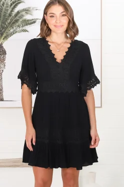 Leelie Mini Dress - Lace Embellished Tiered Dress with Bell Sleeves in Black><noscript><img width=