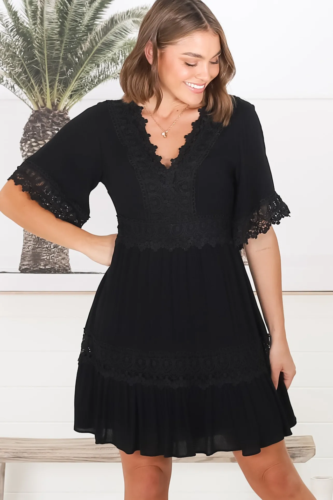 Leelie Mini Dress - Lace Embellished Tiered Dress with Bell Sleeves in Black>Salty Crush