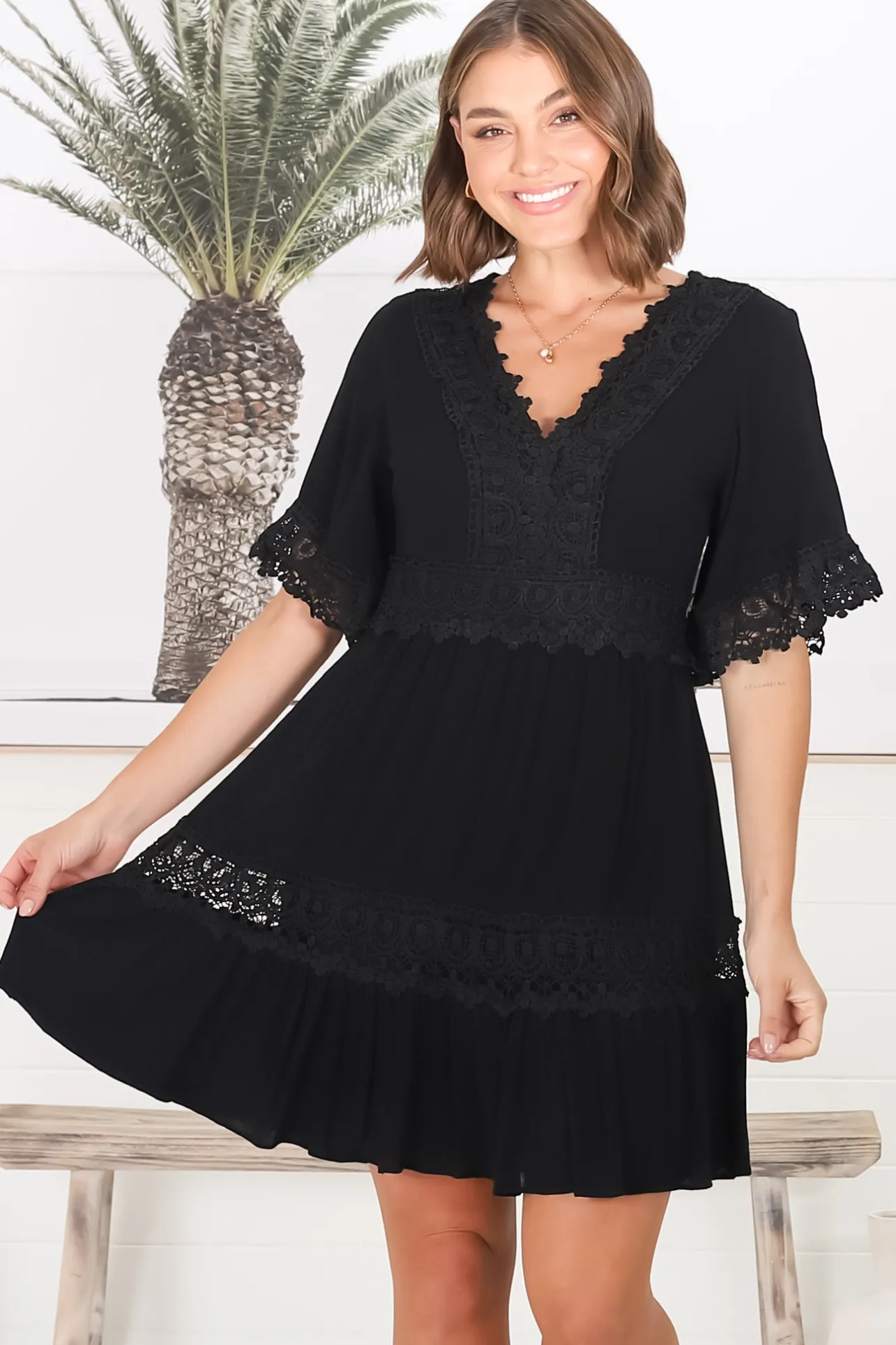 Leelie Mini Dress - Lace Embellished Tiered Dress with Bell Sleeves in Black>Salty Crush