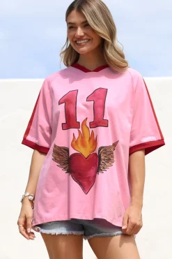 Pink 11 Tee - Graphic Print Short Sleeve T-Shirt with Racer Stripe Sleeves in Pink><noscript><img width=