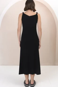 Rosalia Maxi Dress - Asymmetric Neckline Twist Sleeve A-Line Dress in Black><noscript><img width=
